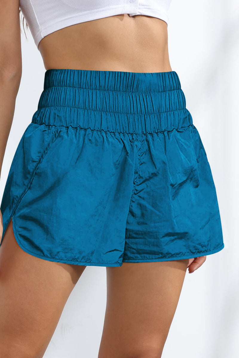 Shorts deportivos fruncidos transpirables