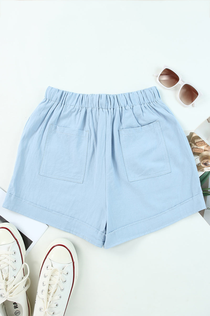 Shorts con bolsillo y cintura elástica con cordón