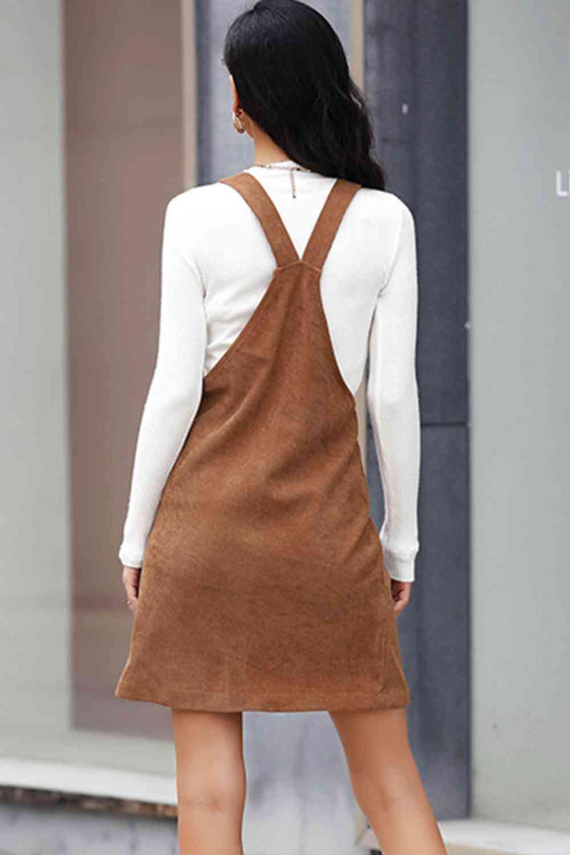 Mini-robe salopette en velours côtelé avec poche